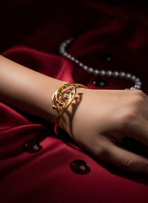 Golden Orbit Wave Bracelet