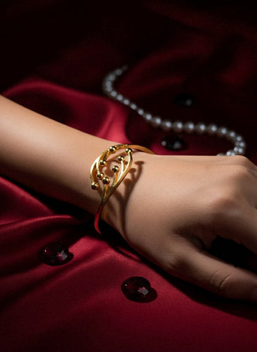 Golden Orbit Wave Bracelet
