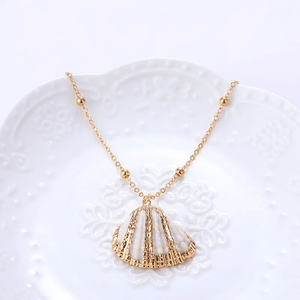 Gold plated seashell pendant