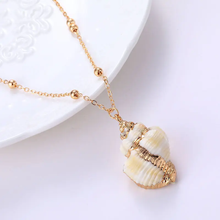 Load image into Gallery viewer, Gold plated seashell pendant